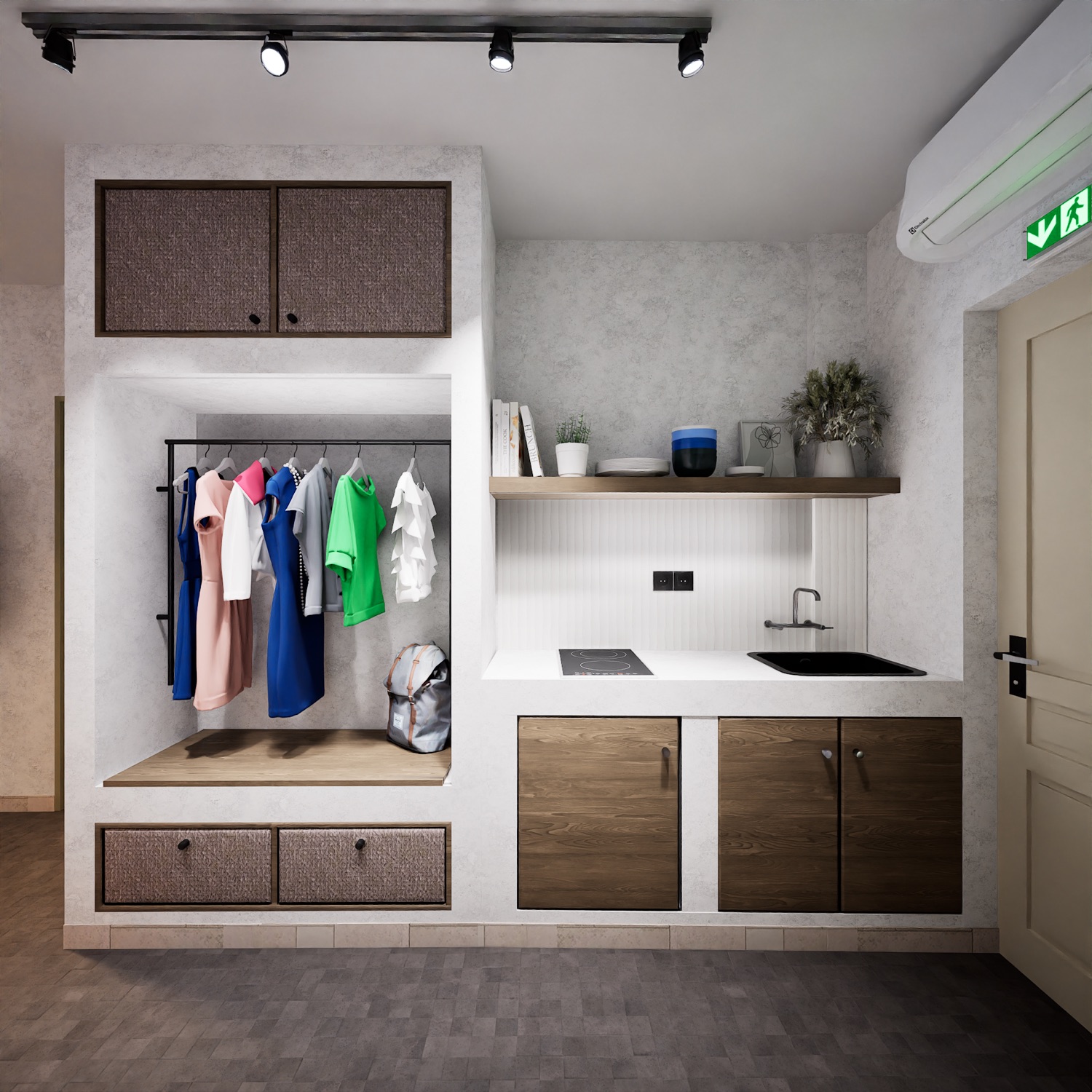 The kitchenette — induction, sink, a shelf of cups
