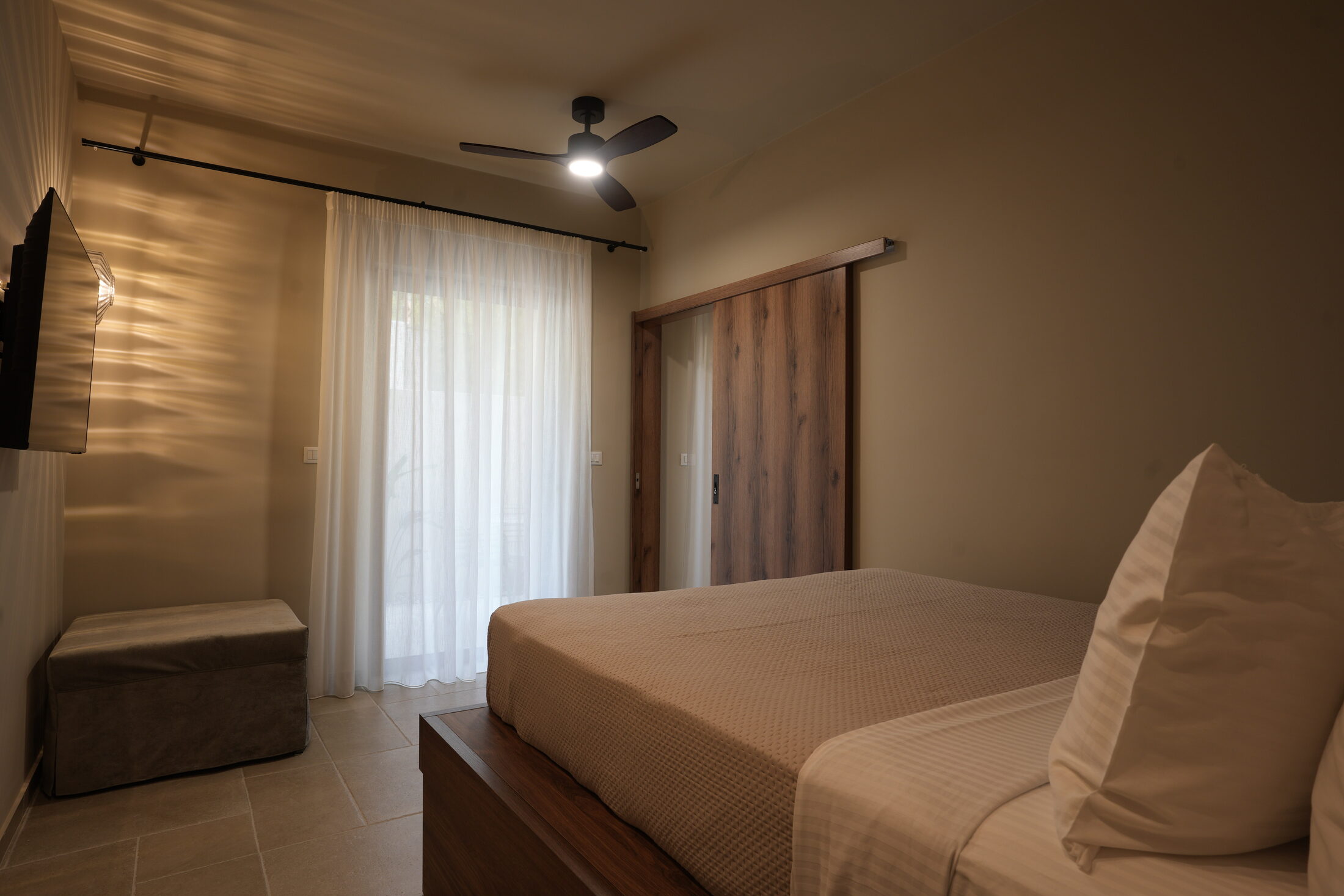 A day in the room — tall doors, bougainvillea