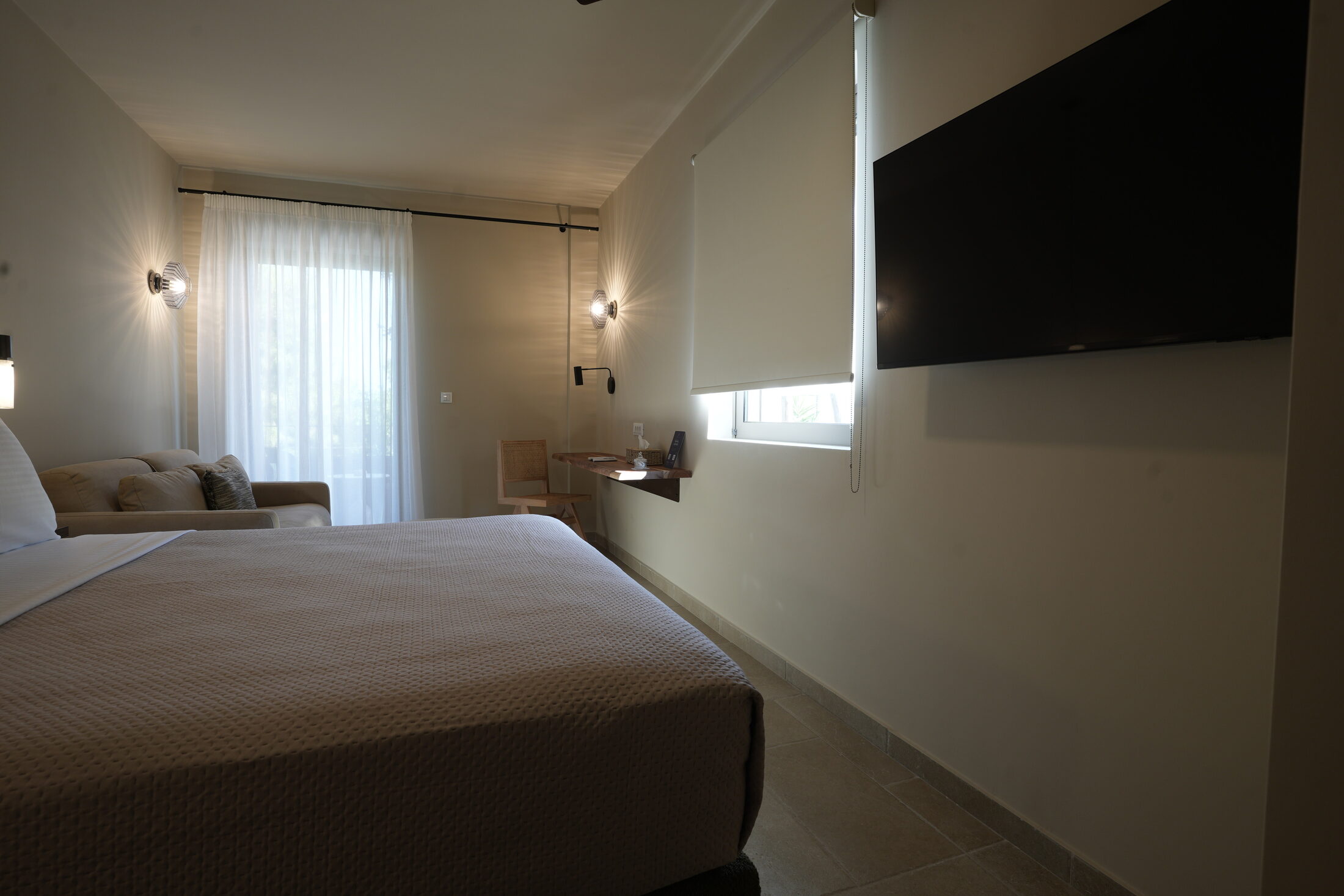 A day in the room — tall doors, bougainvillea