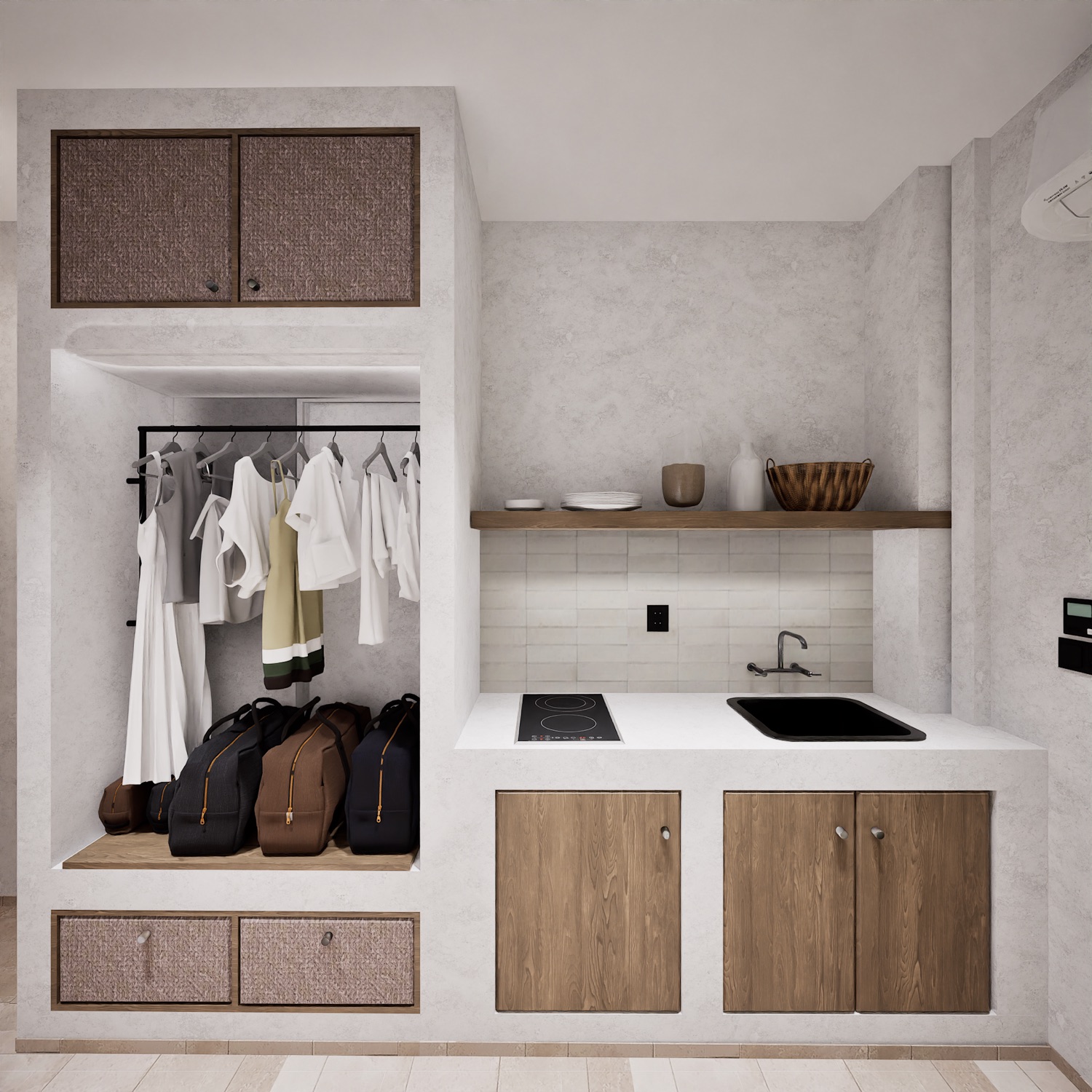 The kitchenette — induction, sink, a shelf of cups